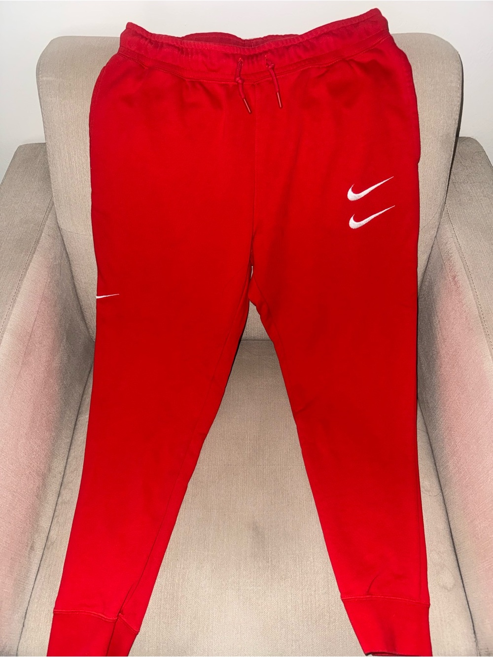 Nike Red Jogger Sweatpants with White Swoosh